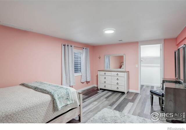 bedroom featuring light hardwood / wood-style floors