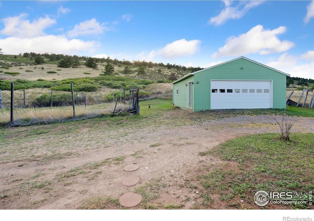 garage with a rural view