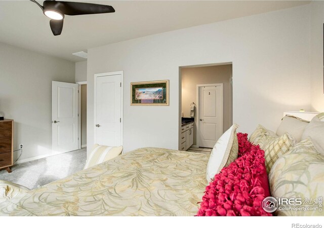 bedroom with connected bathroom and ceiling fan