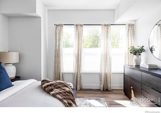 bedroom with light wood-type flooring