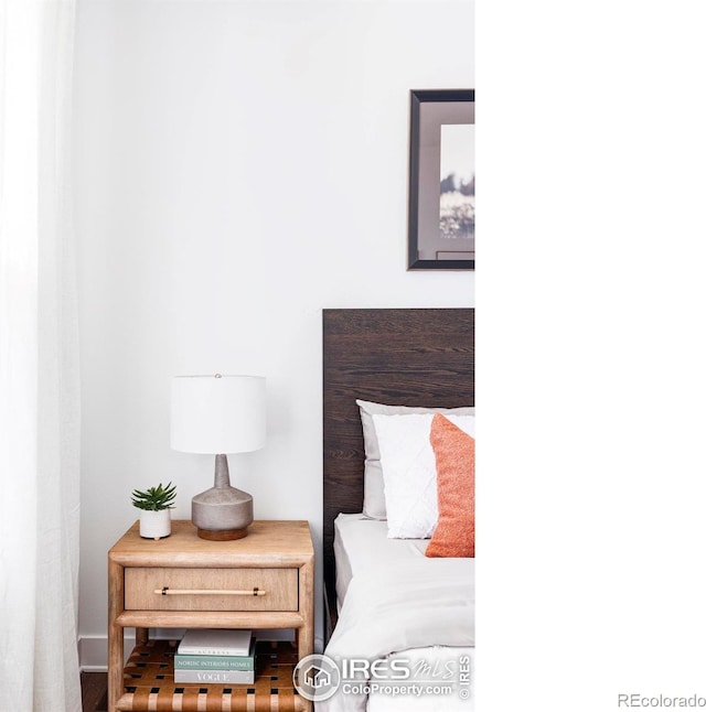 bedroom featuring hardwood / wood-style flooring