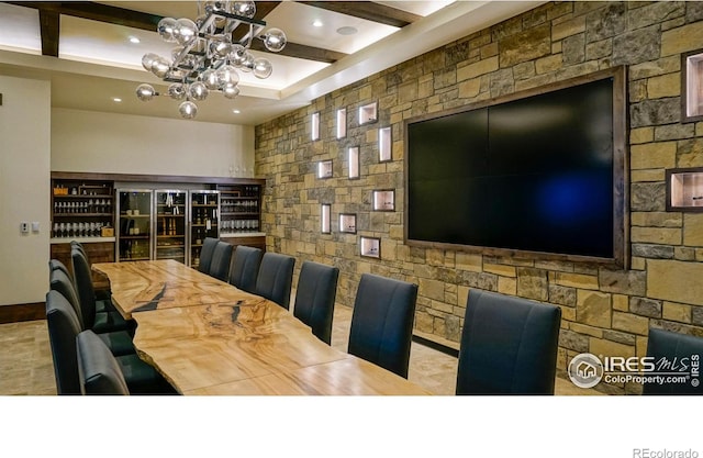3140 Newfound Lake Rd, Berthoud, CO 80513 - dining space with coffered ceiling, a notable chandelier, and beam ceiling