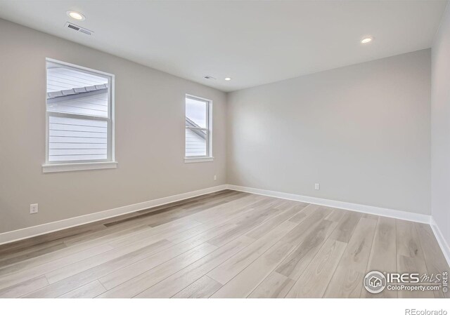3140 Newfound Lake Rd, Berthoud, CO 80513 - empty room featuring light wood finished floors, baseboards, visible vents, and recessed lighting