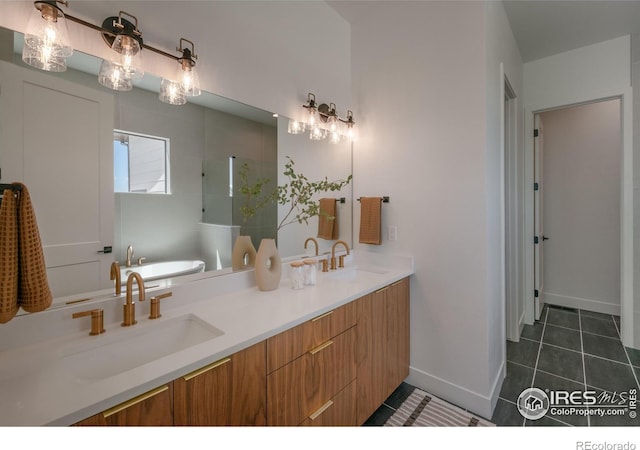 bathroom featuring tile patterned flooring, vanity, and a shower with shower door