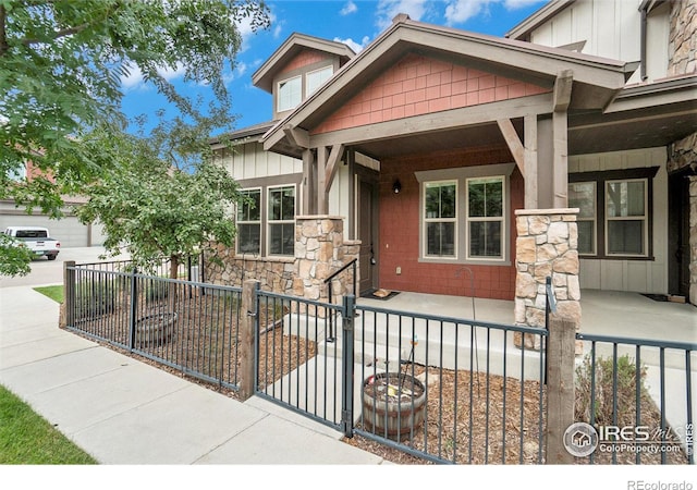 craftsman-style home with covered porch