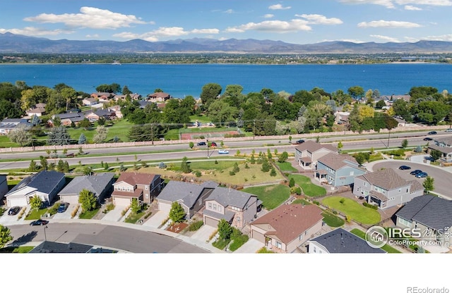 aerial view with a water and mountain view