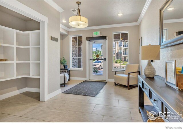 foyer entrance with ornamental molding