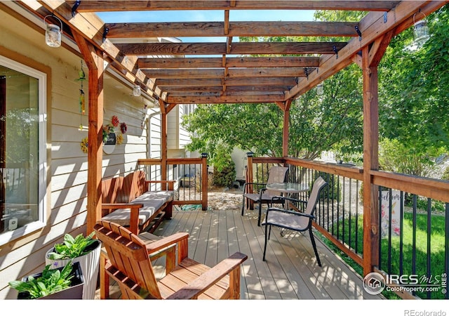 wooden deck with a pergola