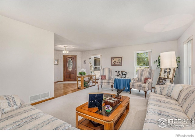 living room with light carpet