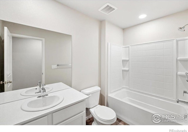 bathroom with vanity, shower / bath combination, recessed lighting, toilet, and visible vents