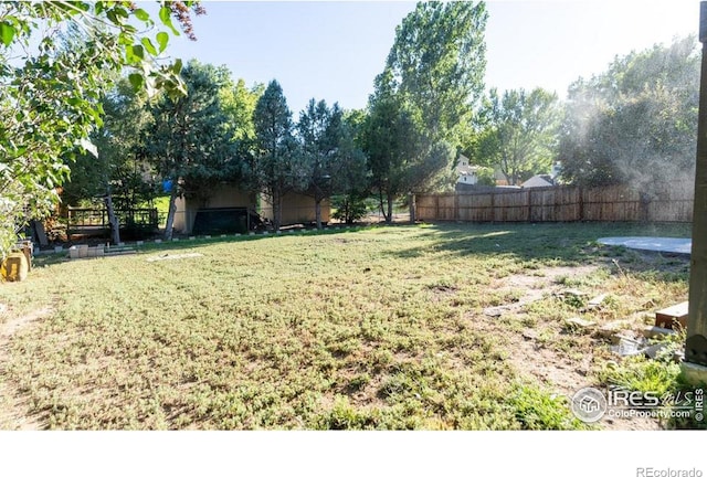 view of yard with fence