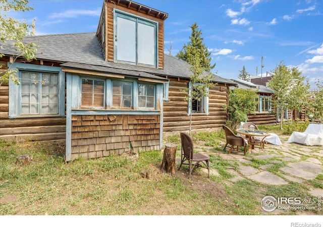 rear view of house with a patio area