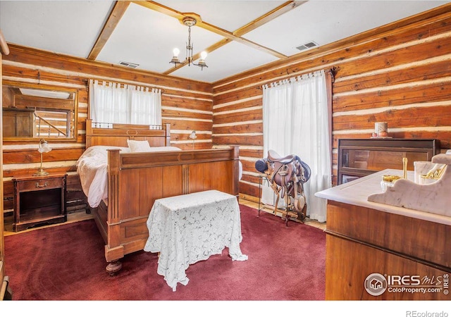 bedroom with visible vents, dark carpet, and multiple windows