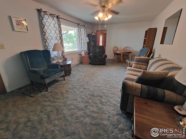 carpeted living room with ceiling fan