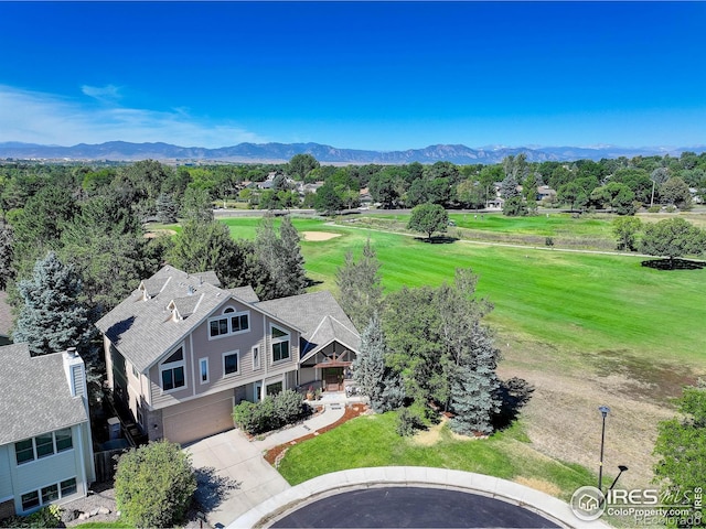 drone / aerial view featuring a mountain view