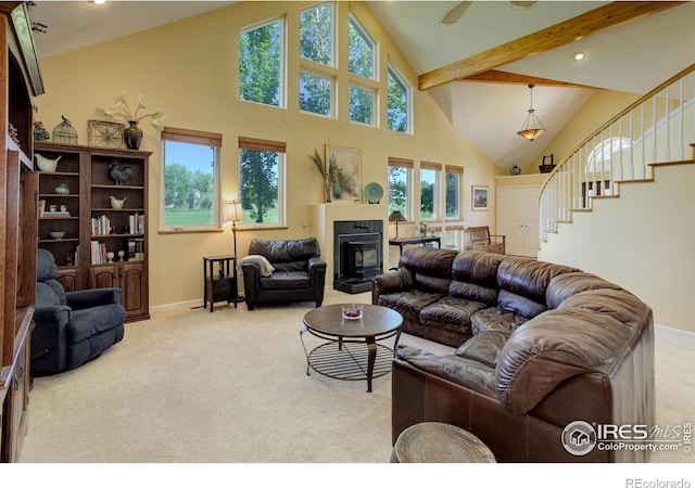 living area featuring stairway, carpet, beamed ceiling, and high vaulted ceiling