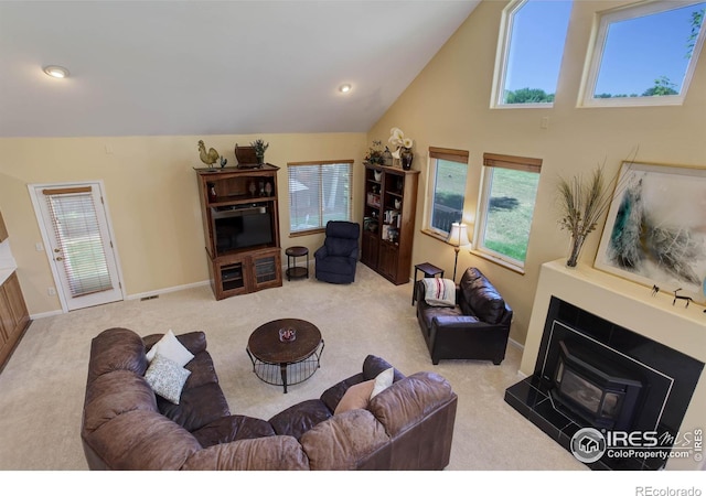 living area with lofted ceiling, recessed lighting, baseboards, and carpet floors