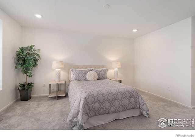 bedroom featuring carpet floors, baseboards, and recessed lighting