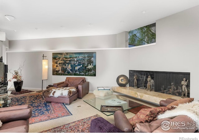 271 Anemone Dr, Boulder, CO 80302 - living area with a fireplace with raised hearth and carpet flooring