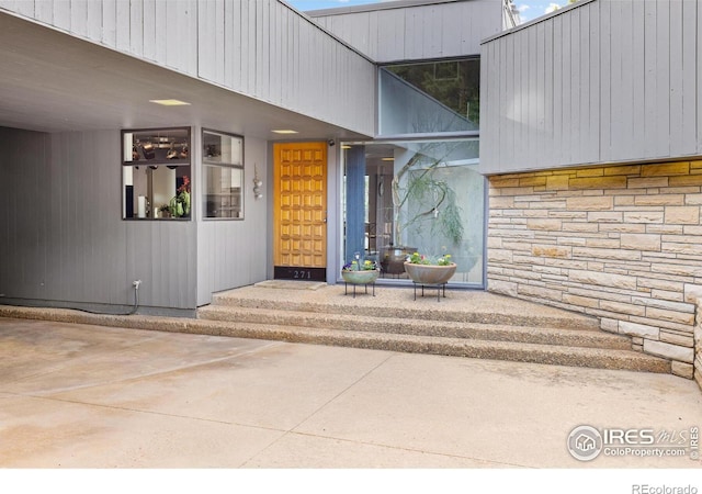 271 Anemone Dr, Boulder, CO 80302 - view of exterior entry featuring stone siding