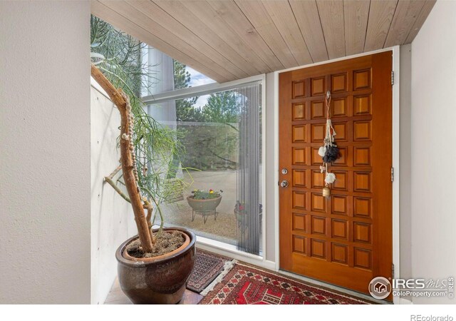 271 Anemone Dr, Boulder, CO 80302 - entrance foyer featuring wooden ceiling