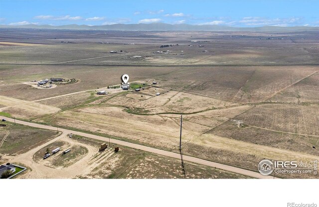 aerial view with a rural view and a mountain view