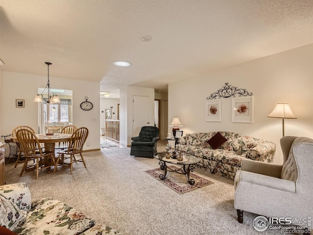 carpeted living room featuring a textured ceiling