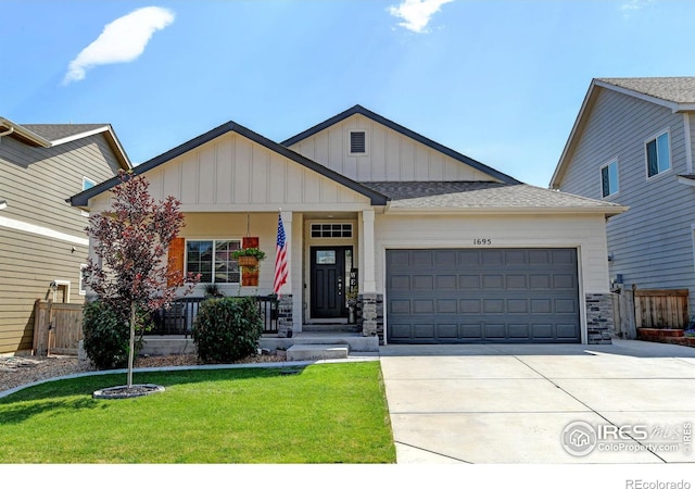 view of front facade featuring a garage and a front lawn