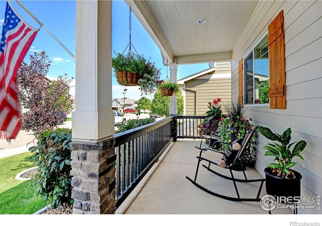 balcony featuring a porch