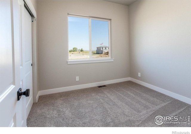 view of carpeted empty room