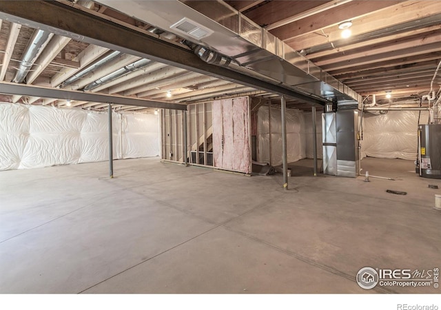 basement featuring gas water heater