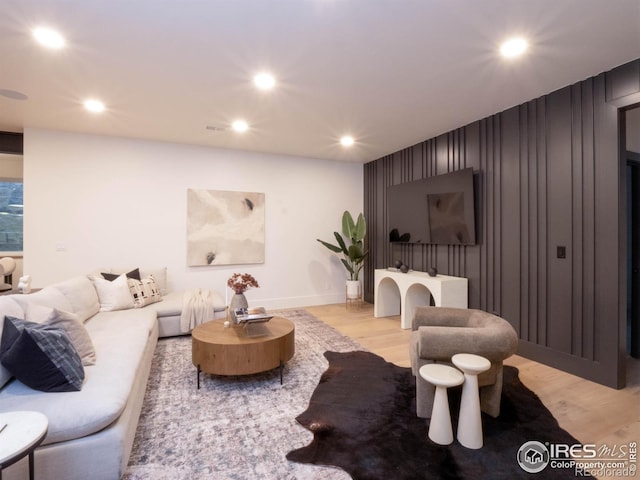 living room with light hardwood / wood-style floors