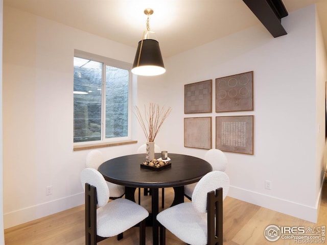 dining space featuring light hardwood / wood-style floors