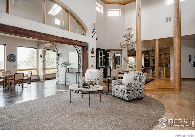 living room featuring a high ceiling