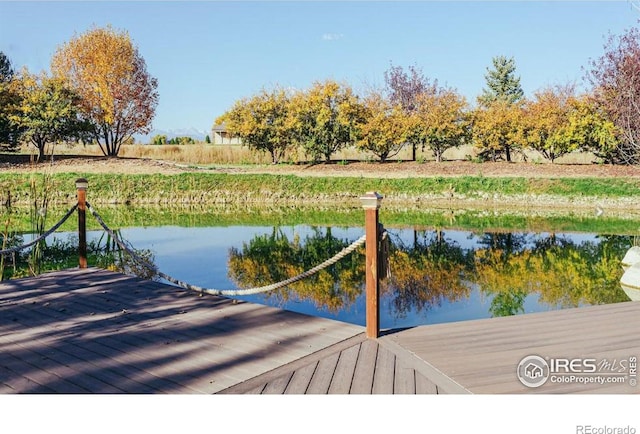 view of dock with a water view