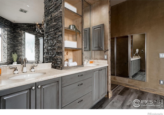 bathroom featuring wood-type flooring and vanity