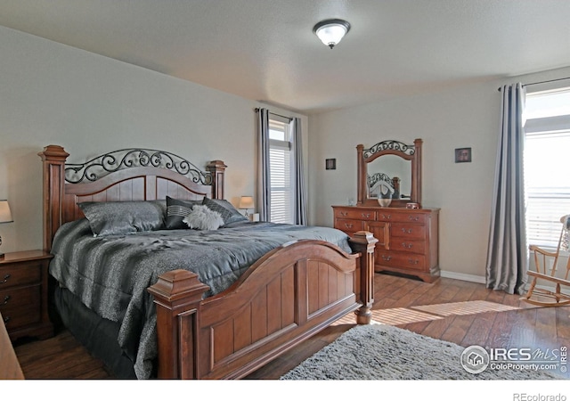 bedroom featuring hardwood / wood-style floors