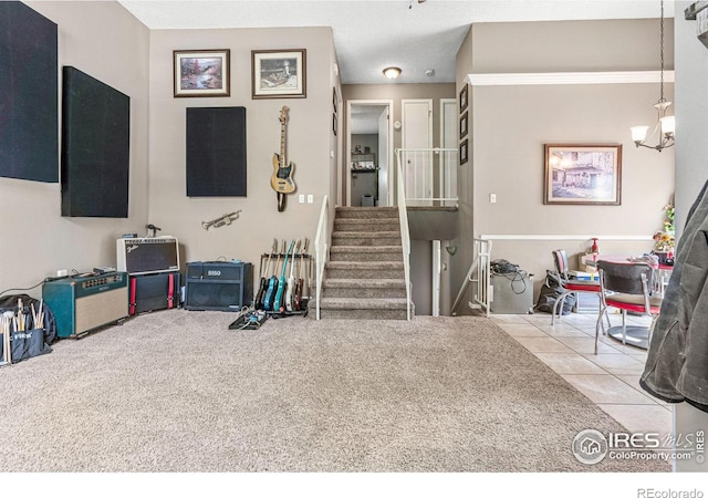 interior space with a textured ceiling, light colored carpet, and an inviting chandelier