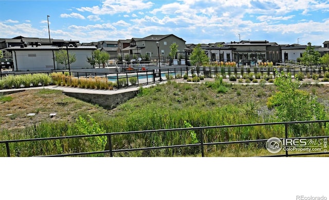 view of community with a swimming pool