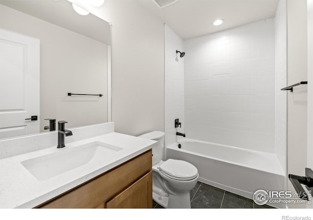 bathroom with toilet, tile patterned flooring, bathing tub / shower combination, and vanity