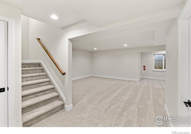 basement with light carpet