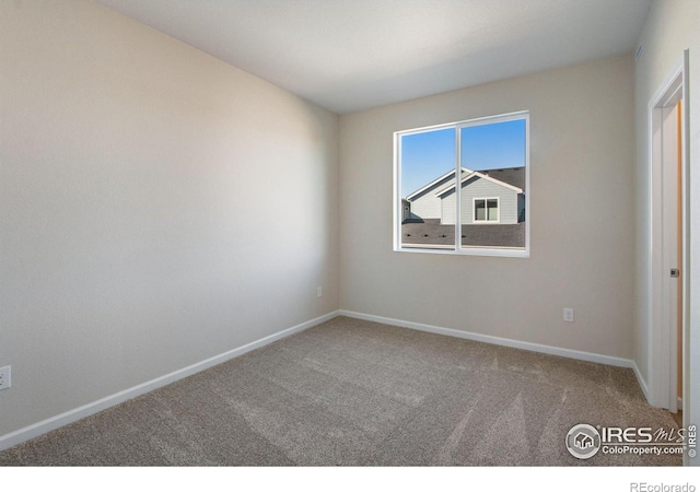 view of carpeted spare room