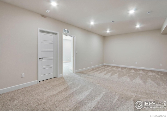 view of carpeted spare room