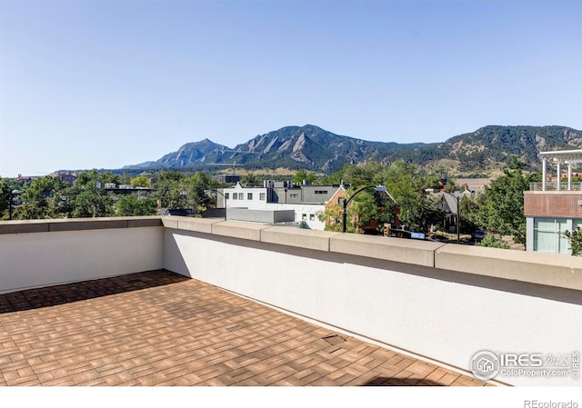 view of patio with a mountain view