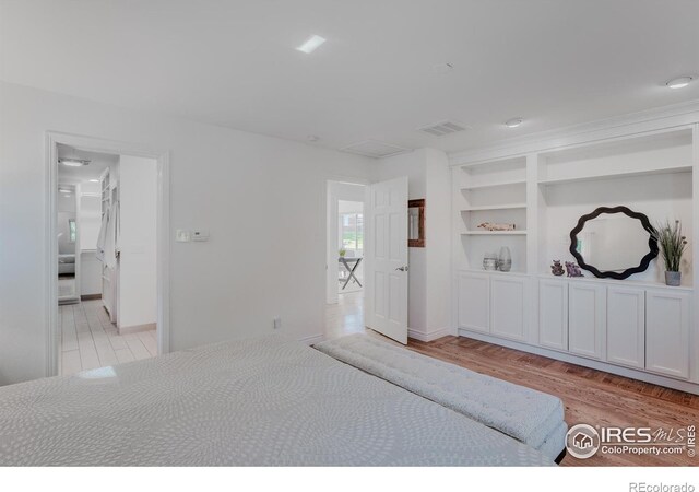 bedroom featuring light hardwood / wood-style floors