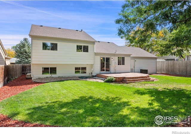 177 S Polk Ave, Louisville, CO 80027 - back of house featuring a patio, a fenced backyard, and a yard