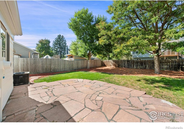 177 S Polk Ave, Louisville, CO 80027 - view of patio / terrace featuring central AC unit and a fenced backyard