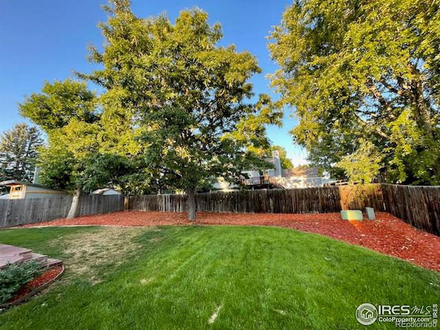 177 S Polk Ave, Louisville, CO 80027 - view of yard featuring a fenced backyard