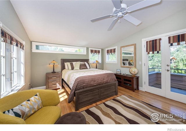 bedroom featuring lofted ceiling, light hardwood / wood-style flooring, ceiling fan, access to exterior, and french doors