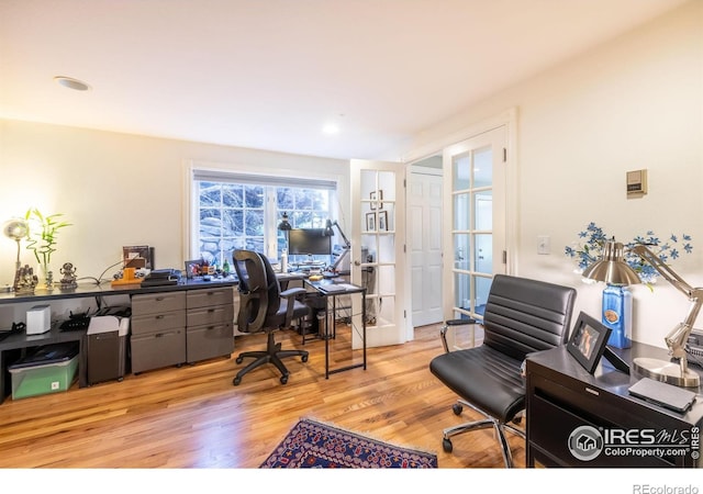 office area with french doors and light wood-type flooring